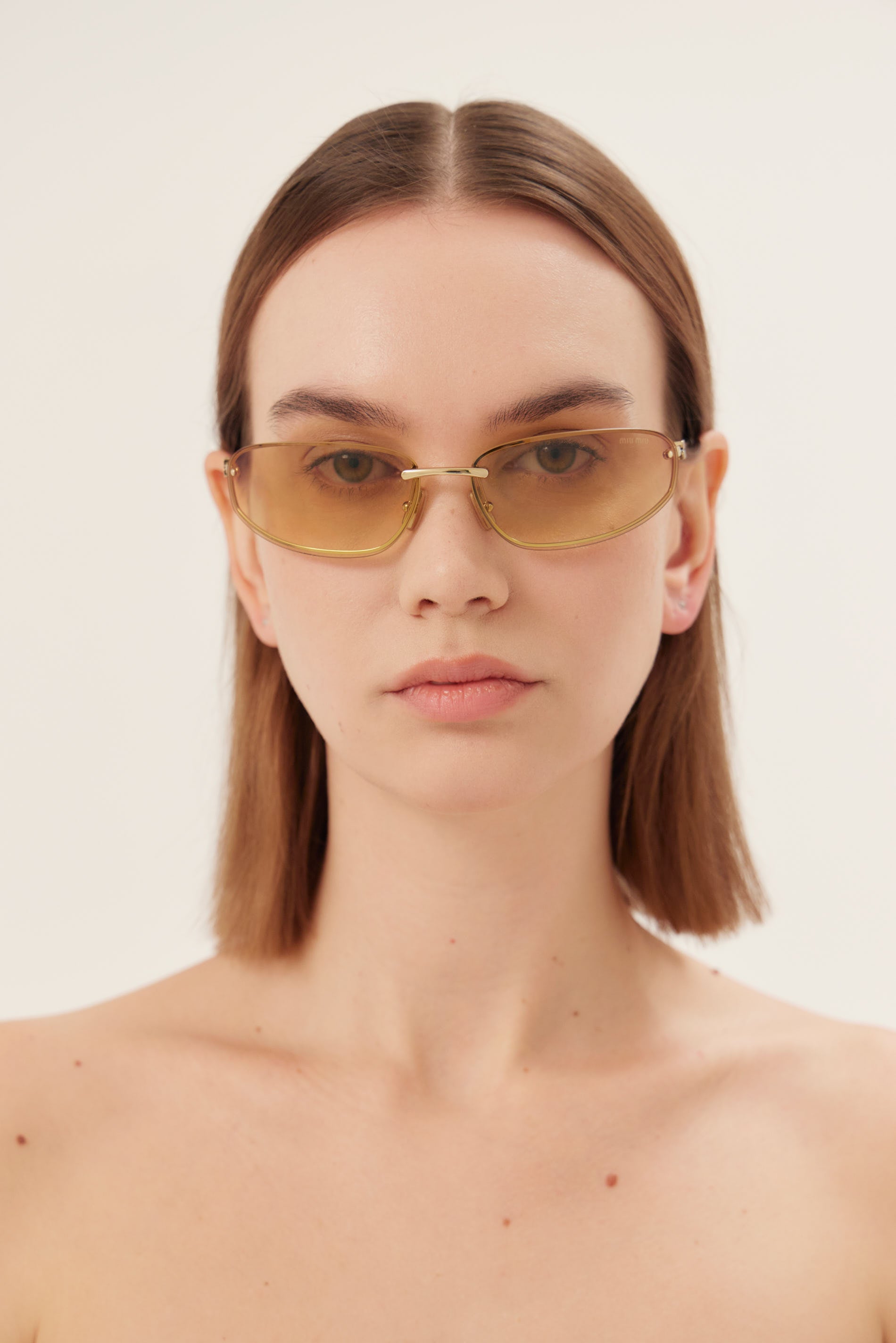 Miu Miu gold racing sunglasses 0MU A50S 5AK7R1