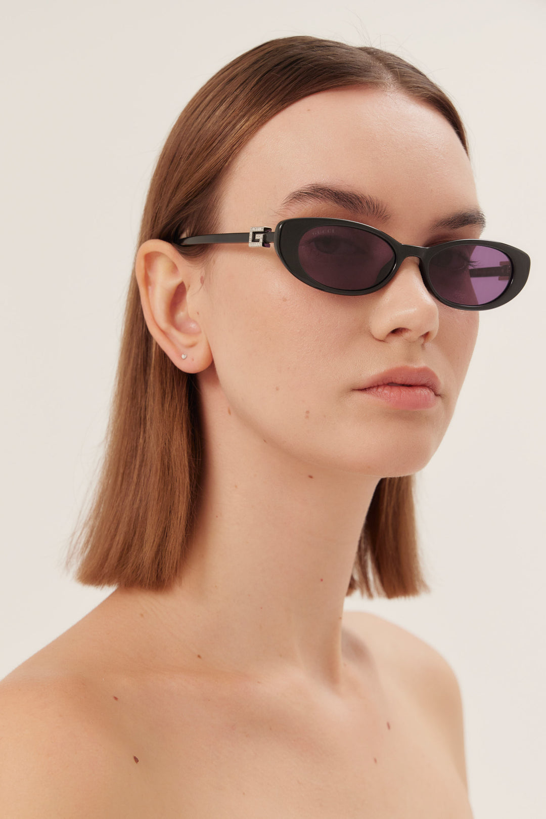 PRE ORDER Oval cat-eye black Gucci sunglasses with bedded logo