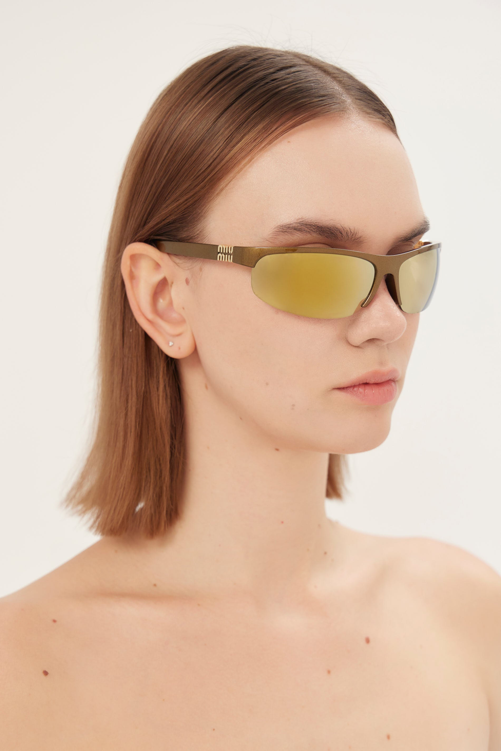 Miu Miu brown and gold sunglasses 0MU A02S 16Y8G1