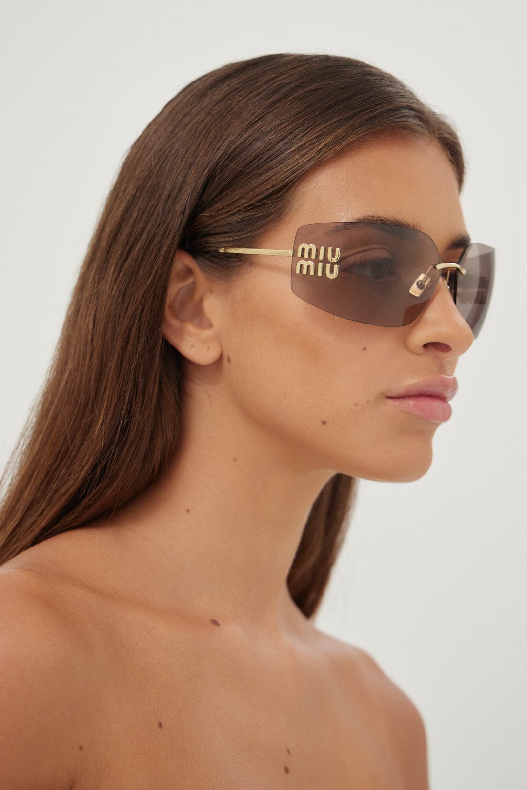 Miu Miu squared metal sunglasses with pink mirror and gold detail - Eyewear Club