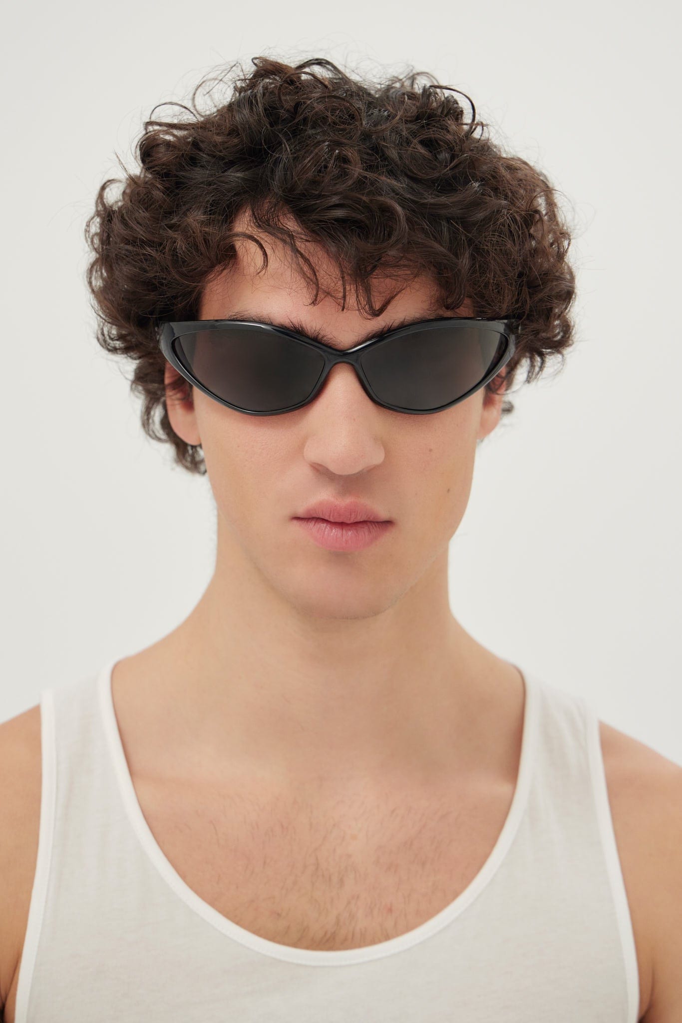 Balenciaga 90S oval sunglasses in black - Eyewear Club