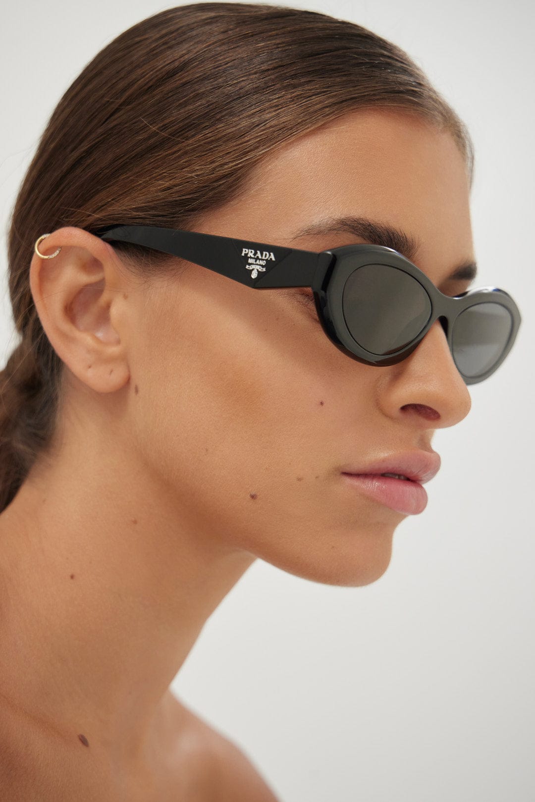 Prada PR26ZS black oval sunglasses - Eyewear Club