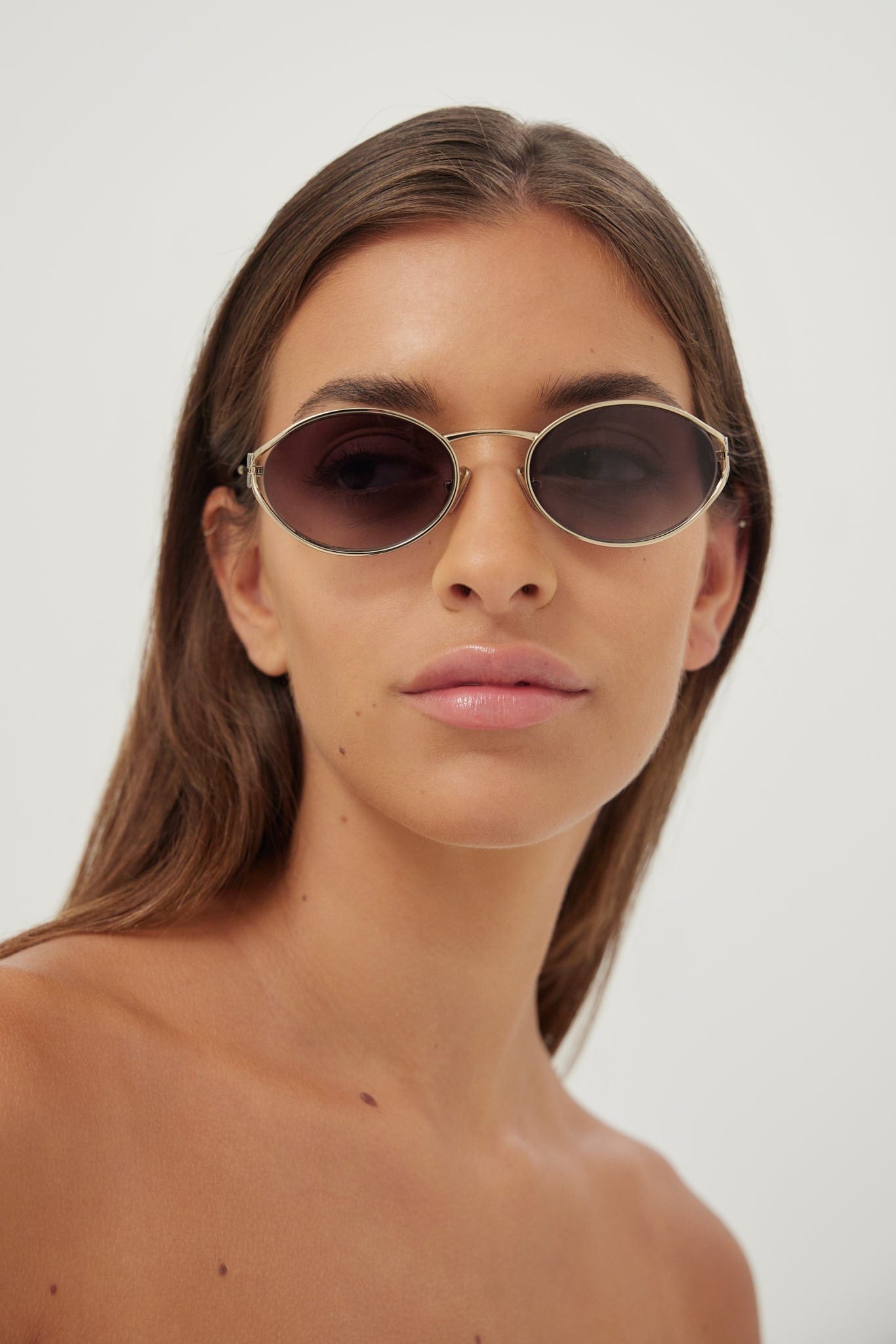 Miu Miu oval metal sunglasses with grey lenses - Eyewear Club