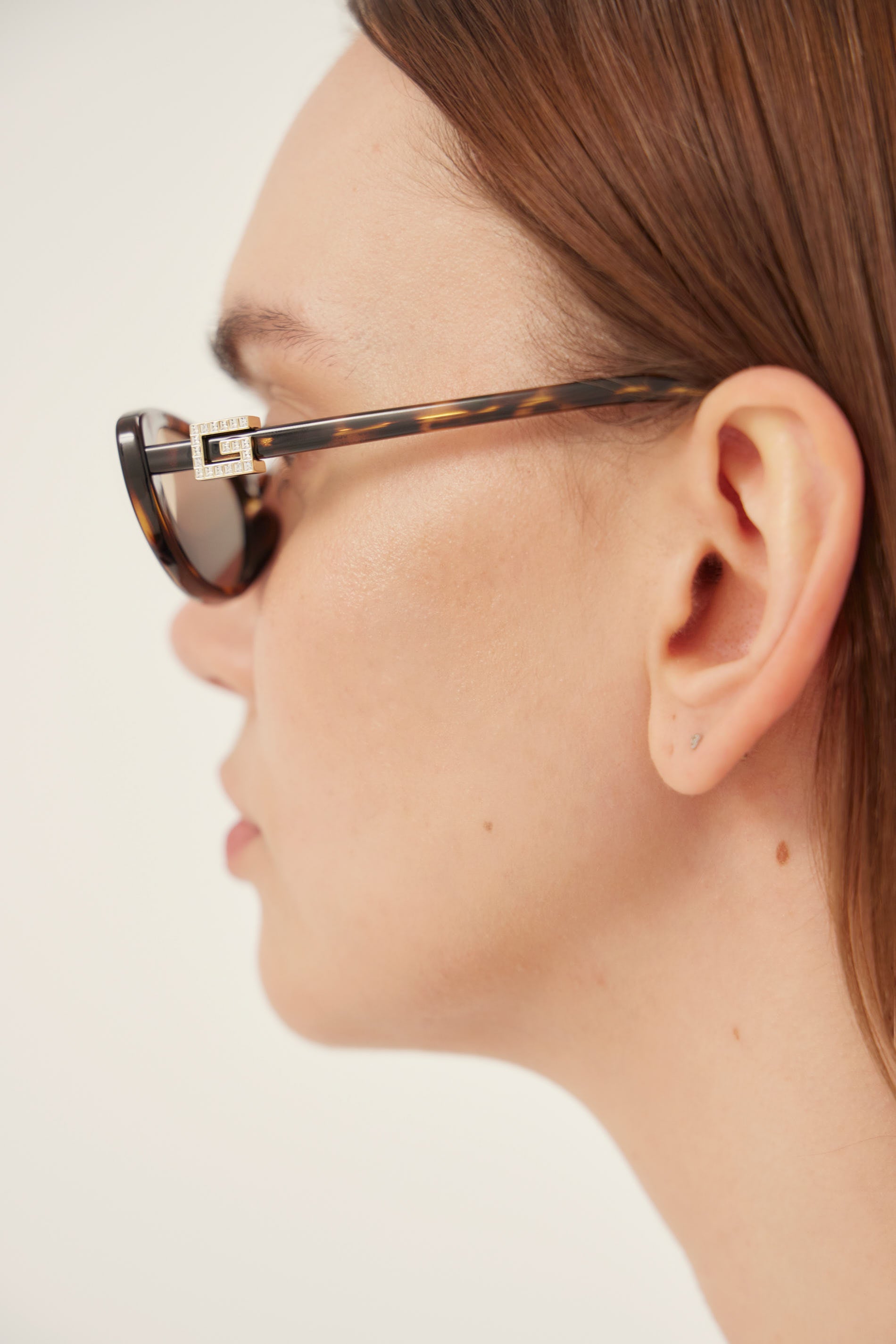 PRE ORDER - Oval cat-eye brown and grey Gucci sunglasses with gold logo