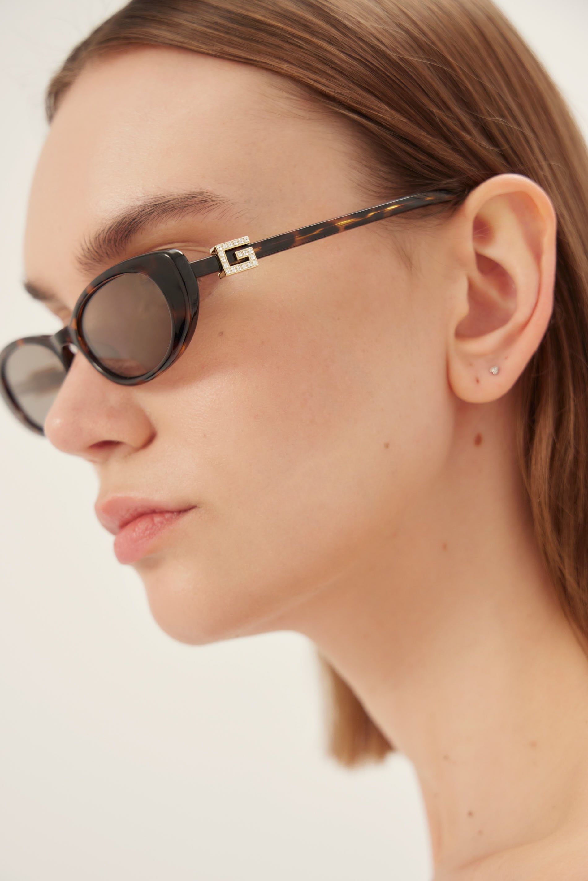 PRE ORDER - Oval cat-eye brown and grey Gucci sunglasses with gold logo
