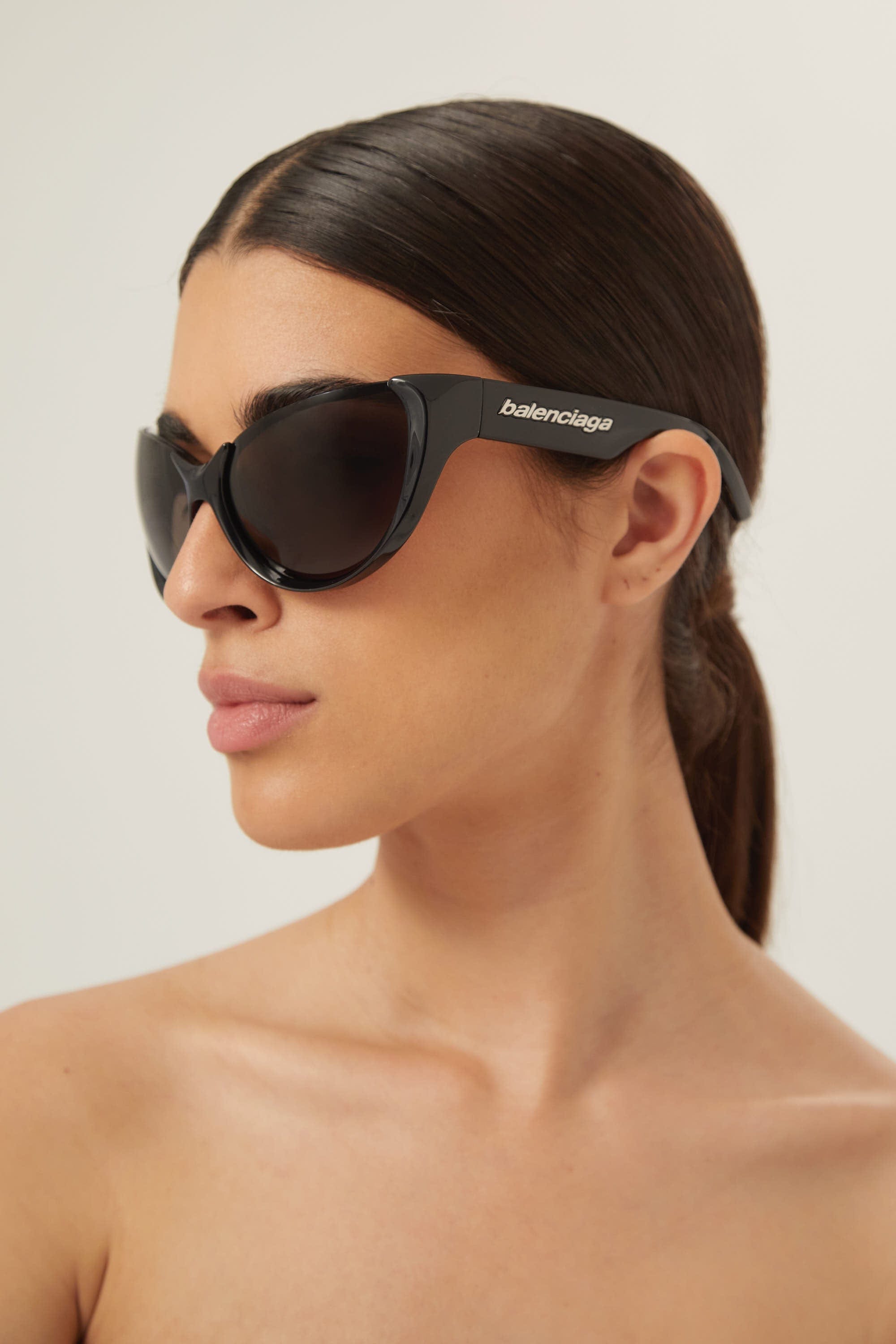 Balenciaga black wrap around sunglasses - Eyewear Club