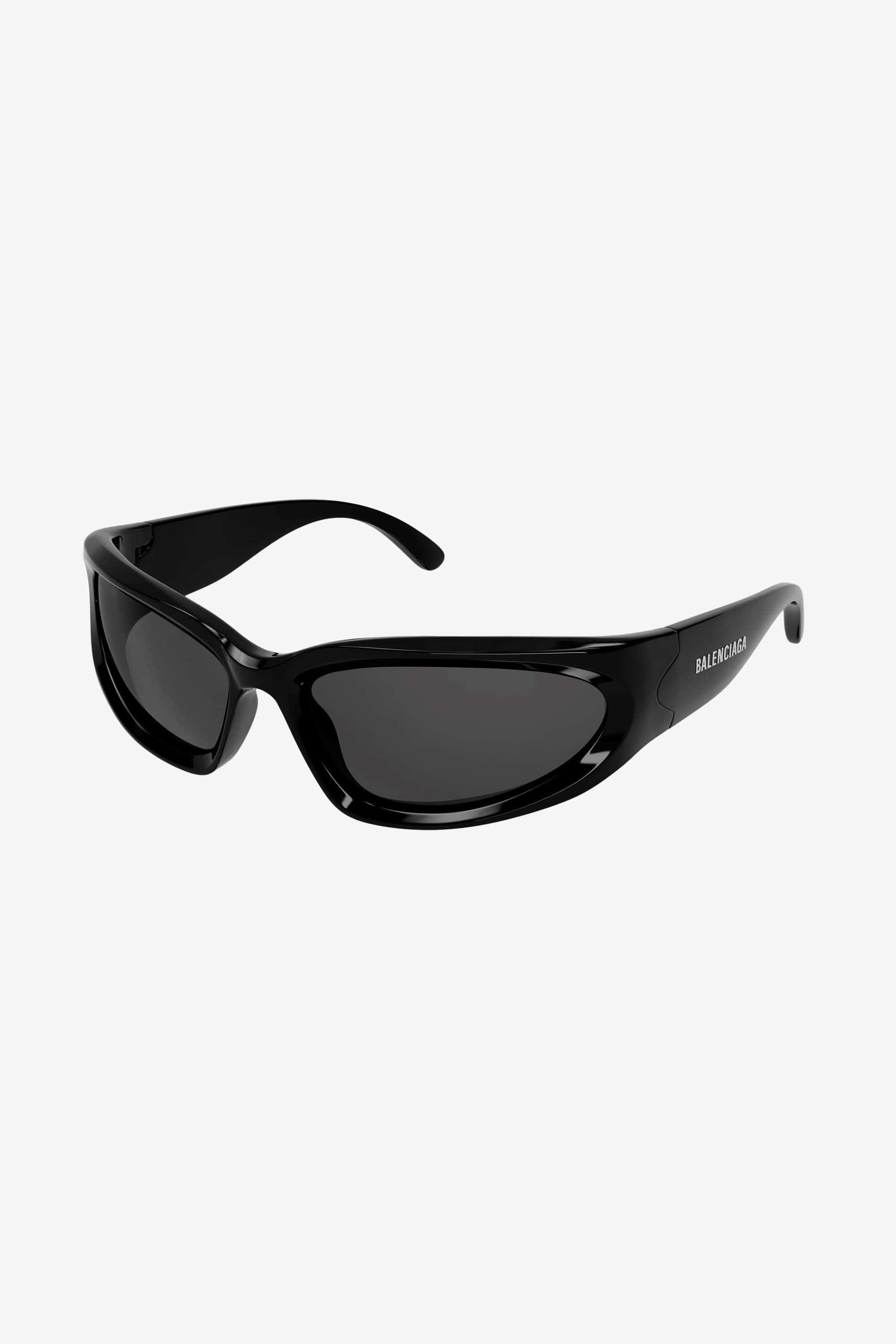 Balenciaga swift black wrap around sunglasses. Kim Kardashian and Justin Bieber sunglasses. BB0157s-001 - Eyewear Club