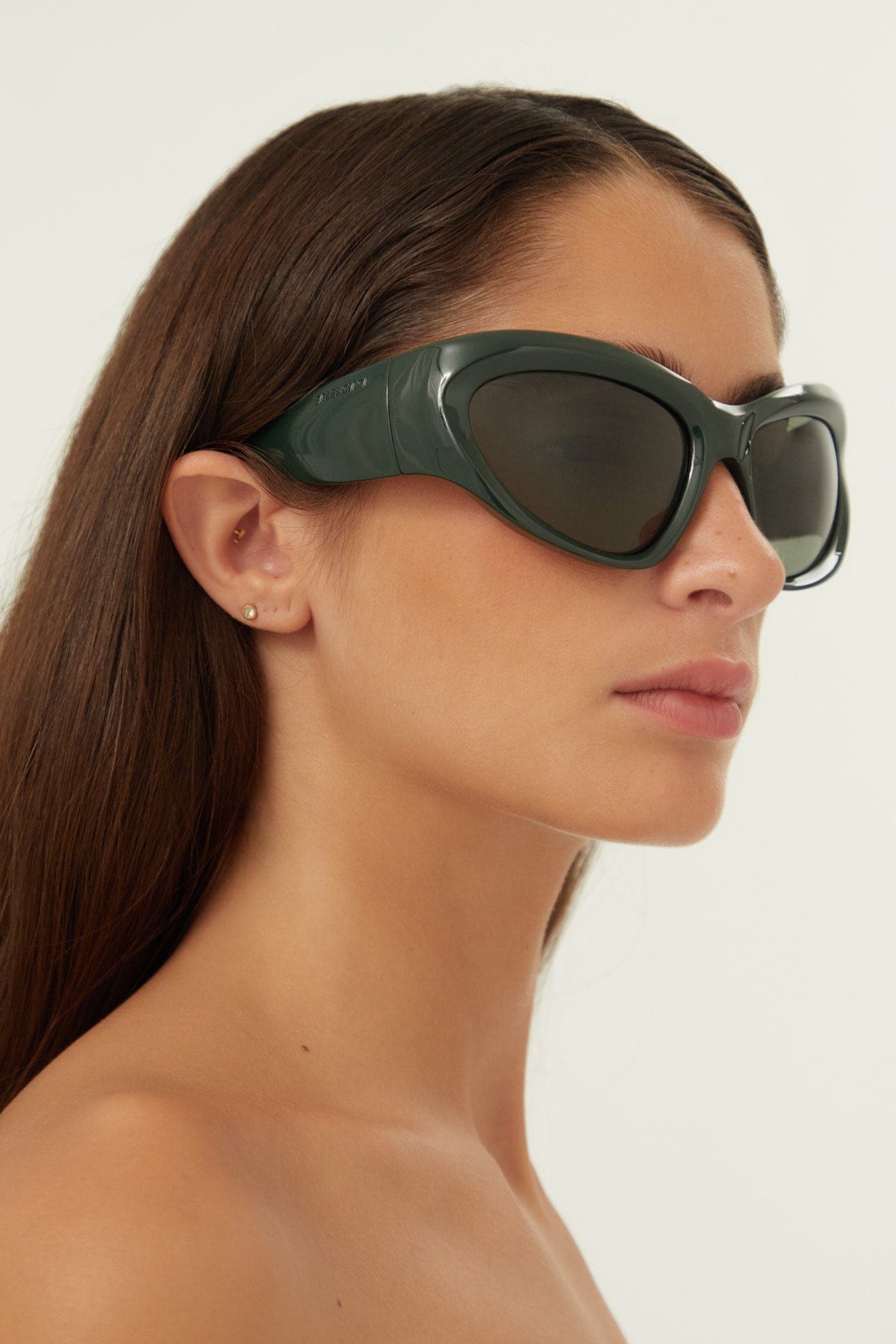 Balenciaga bold wrap around green sunglasses - Eyewear Club