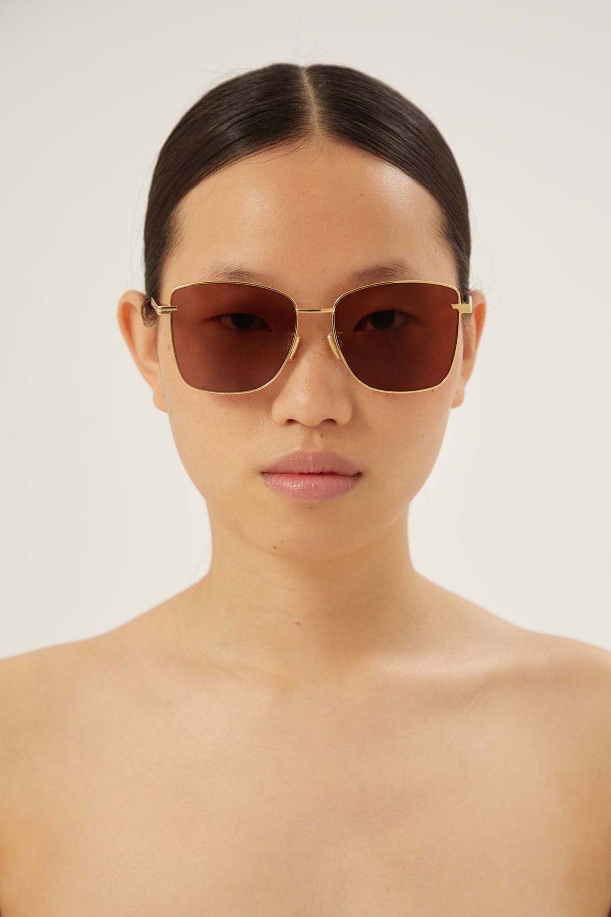 Bottega Veneta squared cat eye gold sunglasses - Eyewear Club