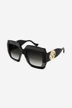 Load image into Gallery viewer, Gucci femenine black sunglasses with integrated GG logo
