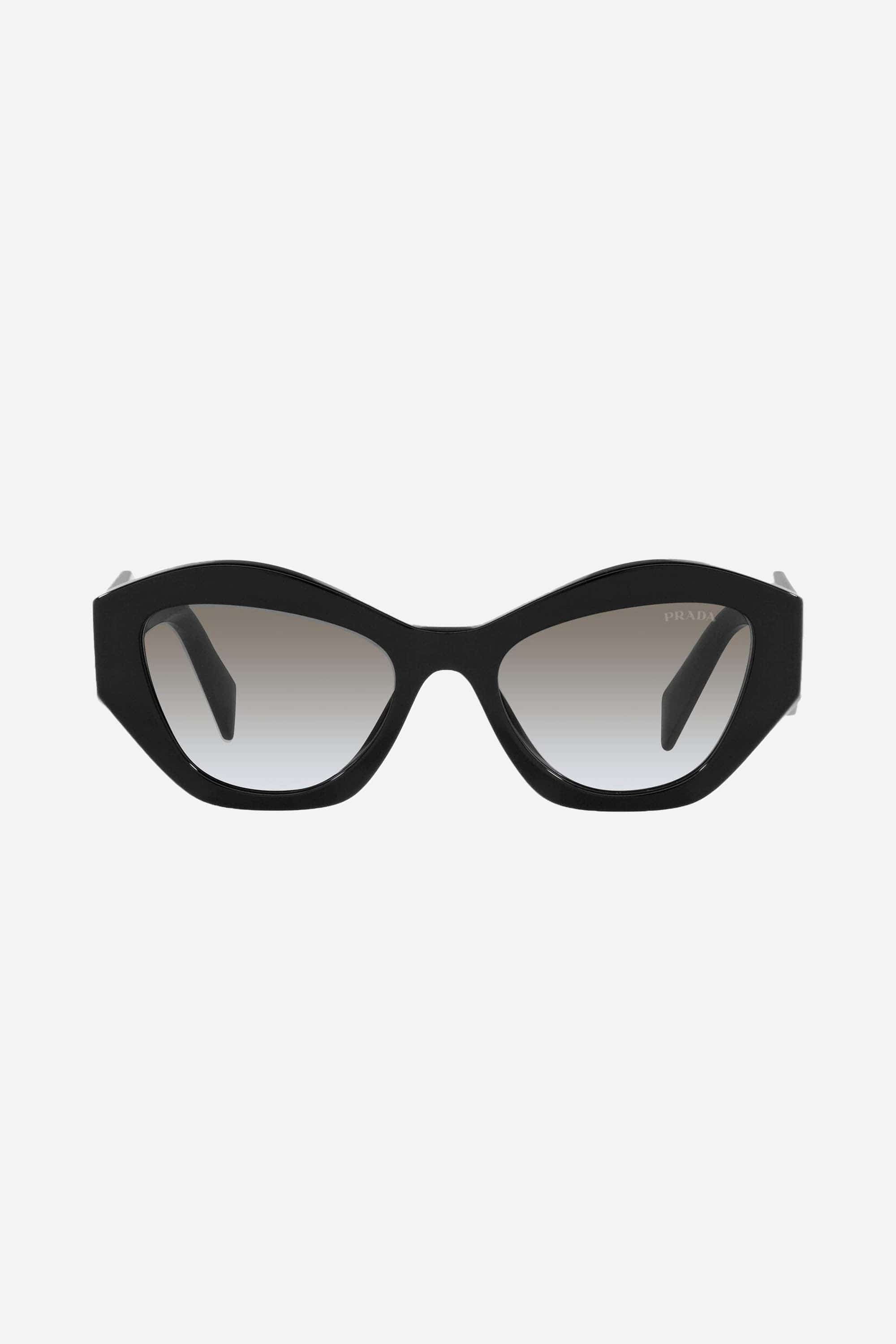Prada oval black sunglasses featuring iconic logo - Eyewear Club