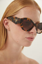 Load image into Gallery viewer, Prada oval sunglasses featuring iconic logo - Eyewear Club

