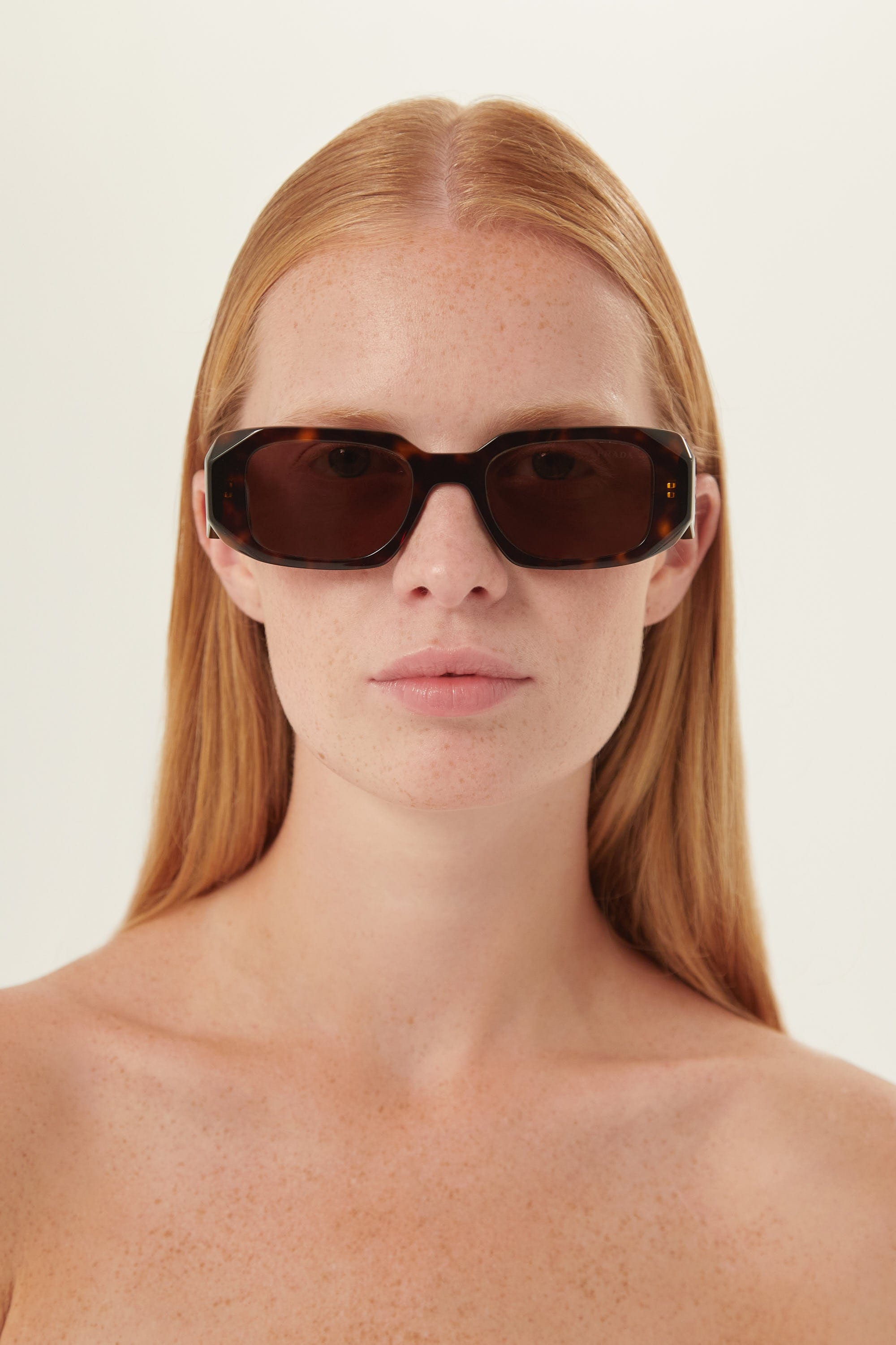 Prada symbol havana oval sunglasses - Eyewear Club